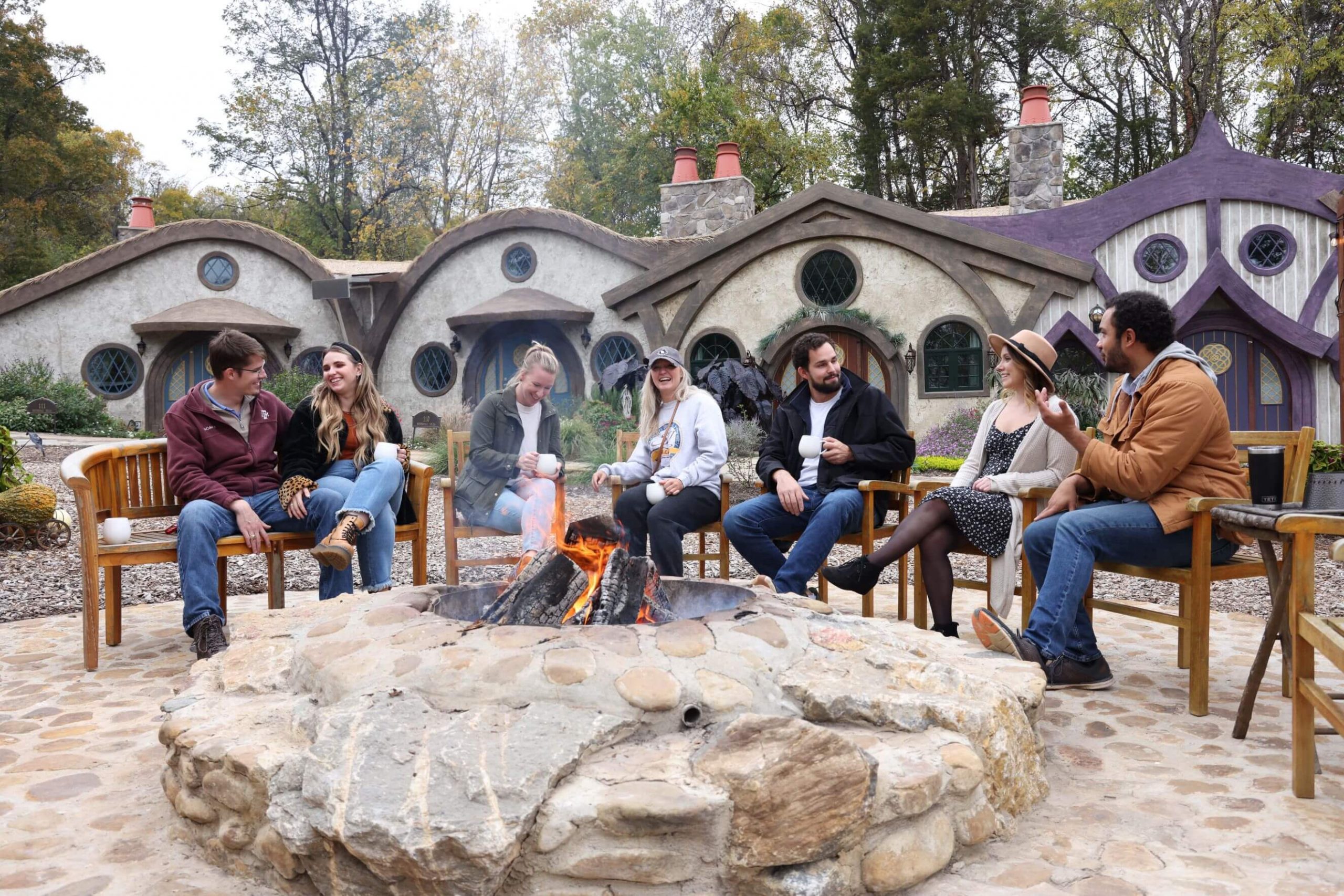 Group of friends at Ancient Lore Village Firepit