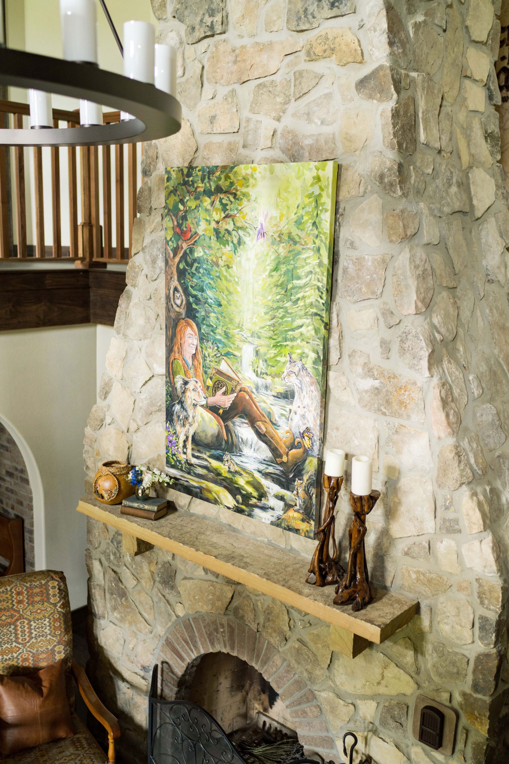 A stone fireplace with a photograph of Bokee, the main character in the book Bokee's Trek