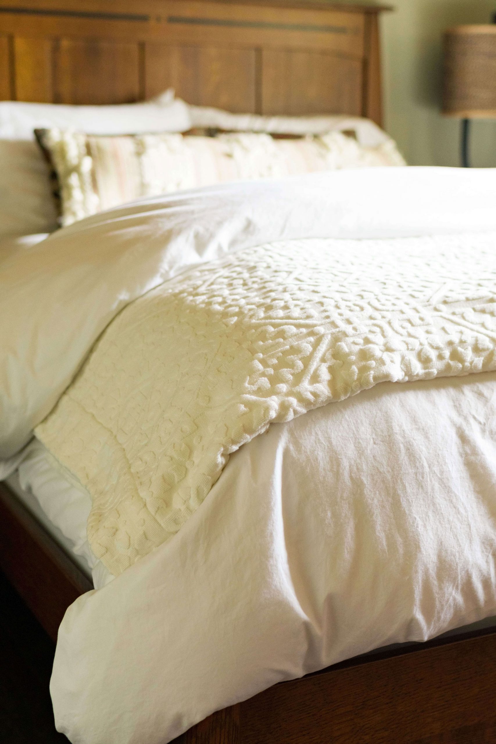 queen bed with a white comforter